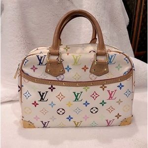 Louis Vuitton White Multicolor Hand Bag in very good condition.  Some scratches.
